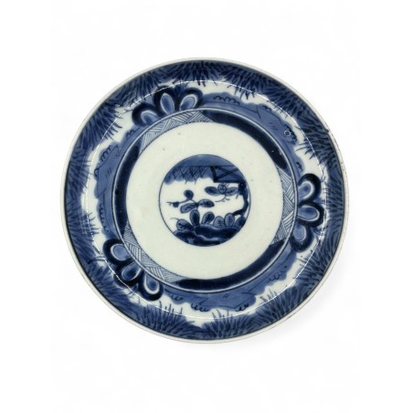 Assiette en porcelaine mi 19eme