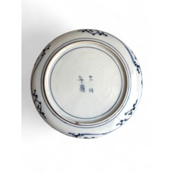 Assiette en porcelaine mi 19eme