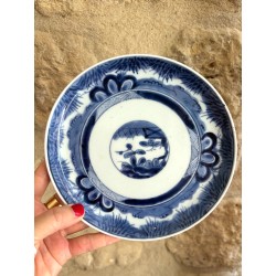 Assiette en porcelaine mi 19eme