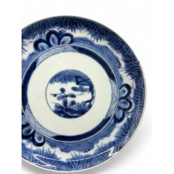 Assiette en porcelaine mi 19eme